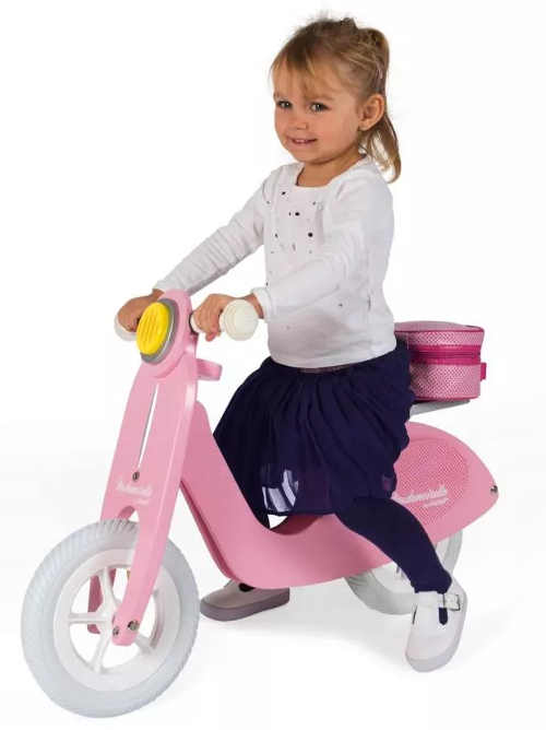 Růžové dřevěné dětské odrážedlo motorka